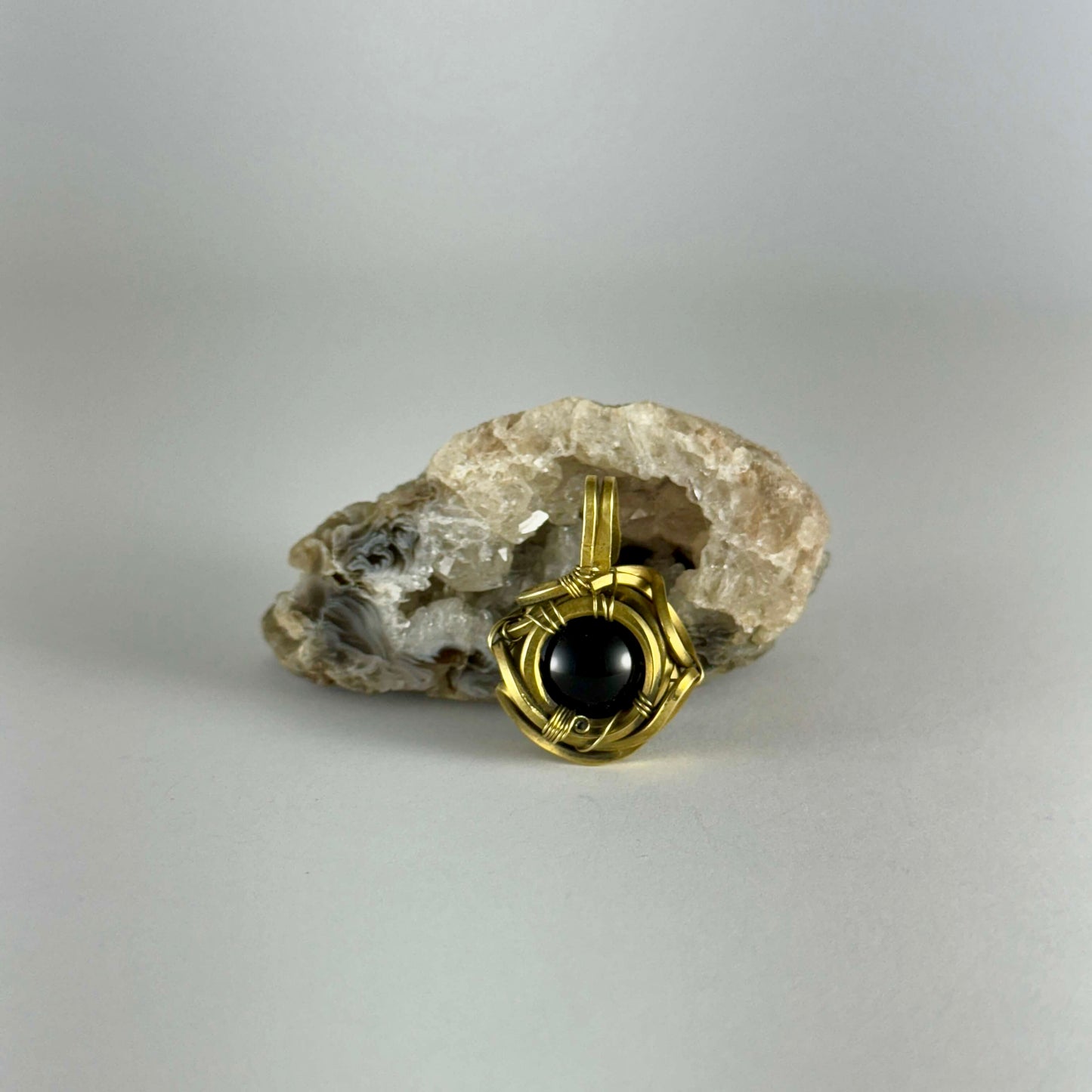 Dije de obsidiana negra