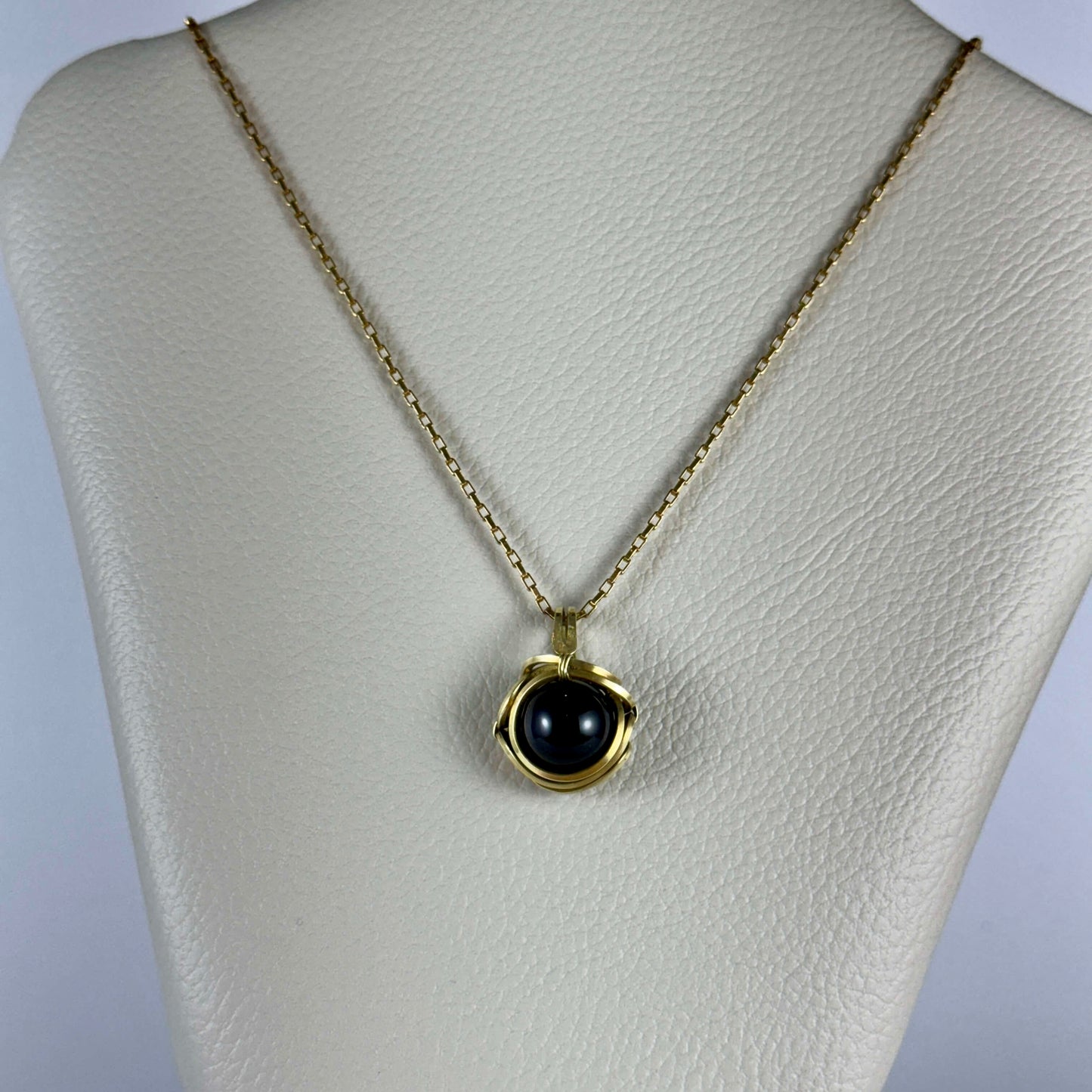 Dije de obsidiana negra