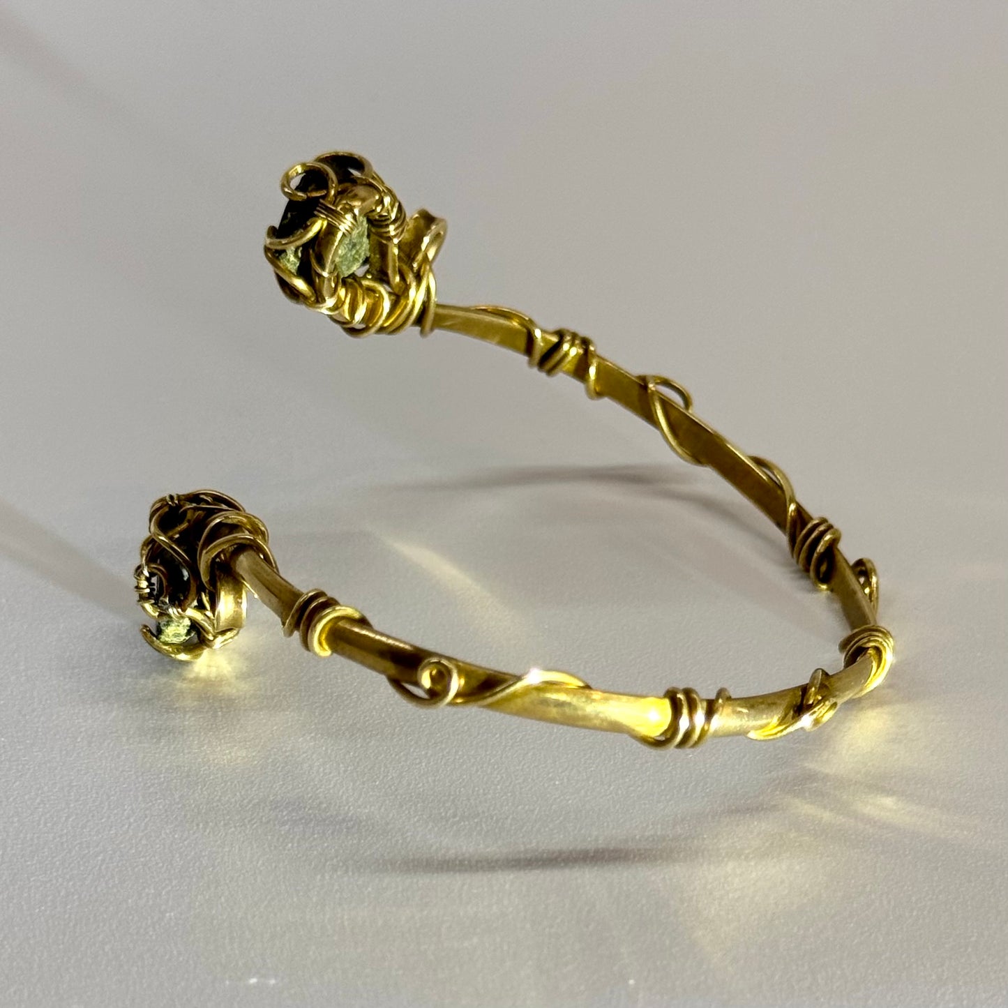 Brass bracelet with two geodes