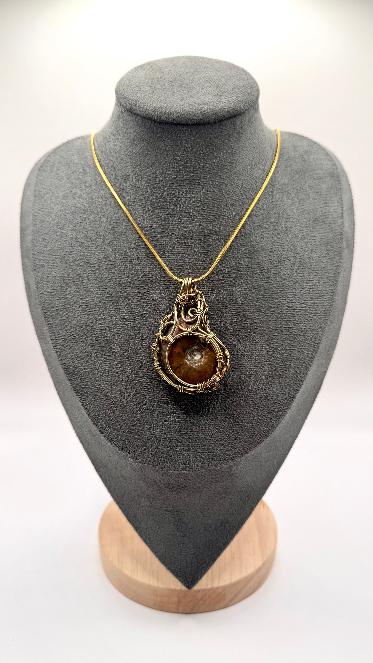 Opalized Ammonite Pendant. Wire wrap.